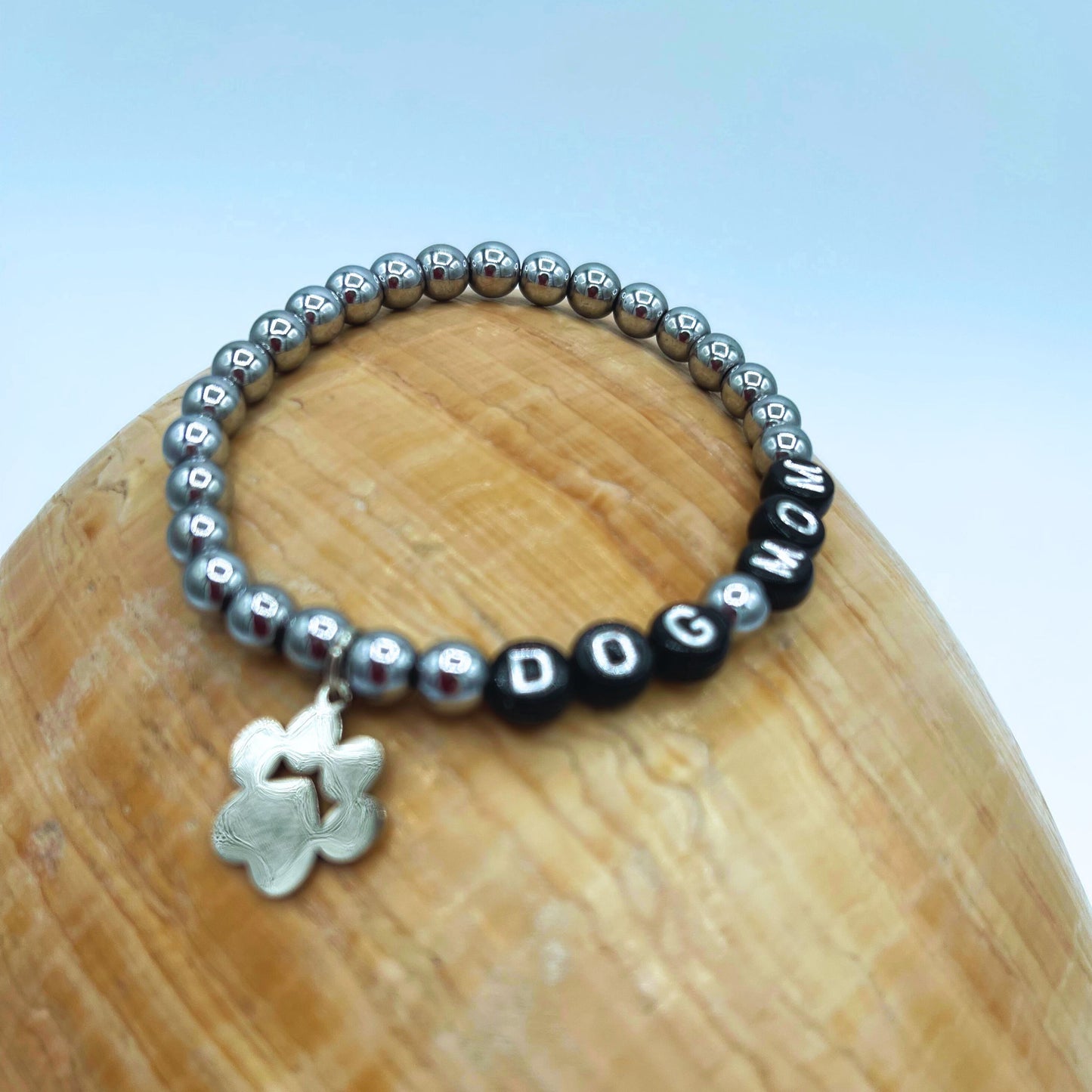 silver tone paw charm on stretch hematirte dog mom bracelet