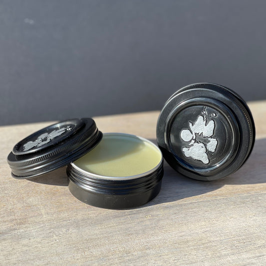 Organic Hand Crafted Paw and Nose Balm to heal and protect both cats and dogs.  Unscented and lick safe.  Dog Paws, Paw Butter, Paw Wax, Paw Protection, Paw Healing, Organic Dog, Natural Dog, Natural Dog Grooming, Dog Grooming, Pet Grooming, Dog Healing, Paw Health, Paw Cracks, Cut Paws, Painful Paw Pad